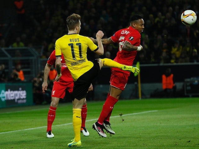 Marco Reus and Nathaniel Clyne in action during the Europa League quarter-final between Borussia Dortmund and Liverpool on April 7, 2016