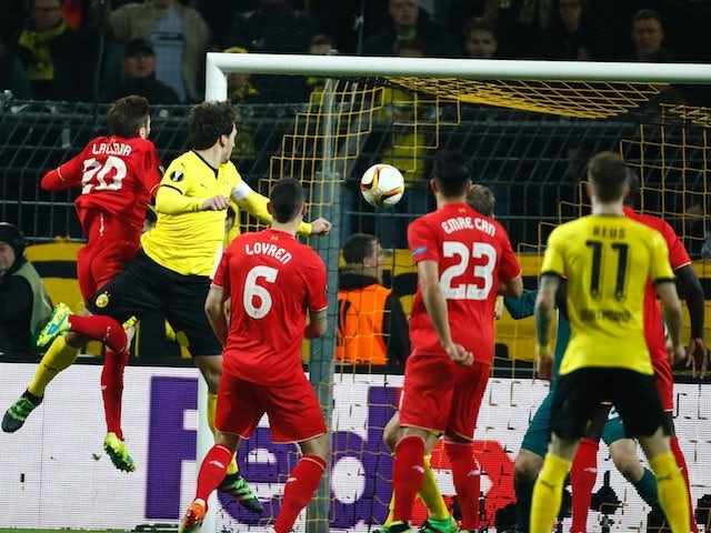 Mats Hummels scores the equaliser during the Europa League quarter-final between Borussia Dortmund and Liverpool on April 7, 2016