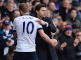 Mauricio Pochettino embraces Harry Kane as he leaves the field during the Premier League game between Tottenham Hotspur and Manchester United on April 10, 2016