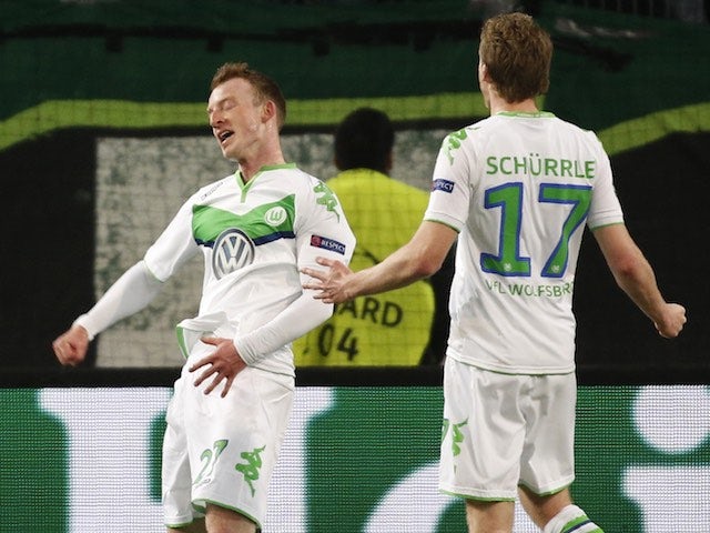 Maximilian Arnold celebrates doubling the lead during the Champions League quarter-final between Wolfsburg and Real Madrid on April 6, 2016