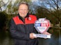 Neil 'three for a tenner' Warnock poses with his Championship manager of the month award for March 2016
