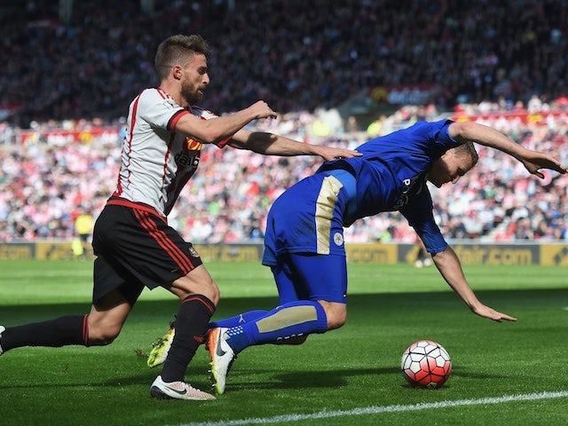 Robert Huth is challenged by Fabio Borini during the Premier League game between Sunderland and Leicester City on April 10, 2016