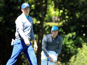 Rory McIlroy and Jordan Spieth in action during round three of The Masters on April 9, 2016