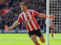Shane Long celebrates scoring the opening goal during the Premier League match between Southampton and Newcastle United on April 9, 2016