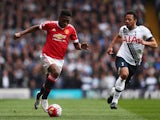 Timothy Fosu-Mensah and Mousa Dembele in action during the Premier League game between Tottenham Hotspur and Manchester United on April 10, 2016