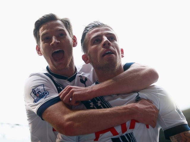 Toby Alderweireld and Jan Vertonghen celebrate during the Premier League game between Tottenham Hotspur and Manchester United on April 10, 2016