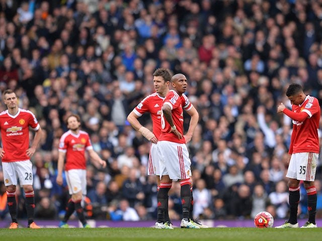 United players look despondent during the Premier League game between Tottenham Hotspur and Manchester United on April 10, 2016