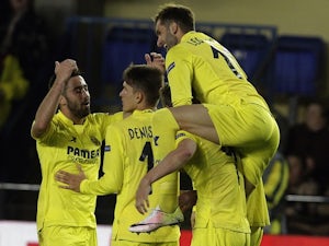 Villarreal players celebrate their second goal during the Europa League quarter-final between Villarreal and Sparta Prague on April 7, 2016
