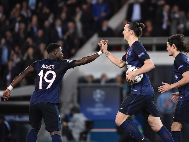 Zlatan Ibrahimovic celebrates the equaliser with Serge 'camper than a row of tents' Aurier during the Champions League quarter-final between Paris Saint-Germain and Manchester City on April 6, 2016