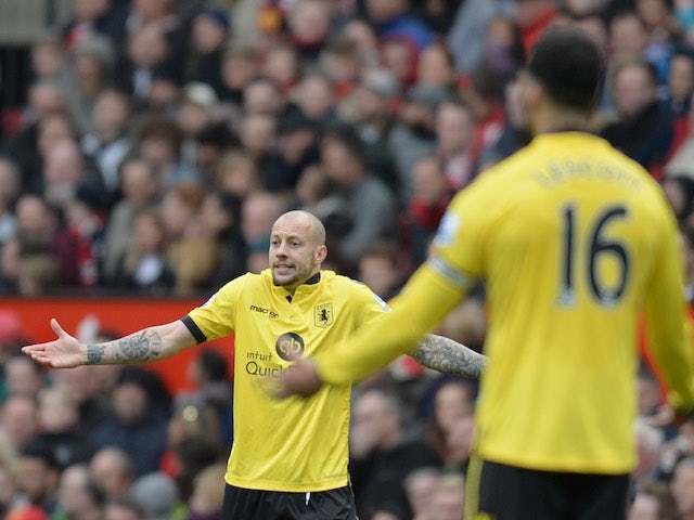 Alan Hutton shrugs during the Premier League game between Manchester United and Aston Villa on April 16, 2016