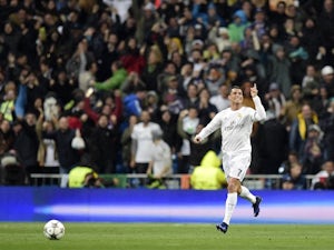 Ronaldo hat-trick sees Real Madrid through