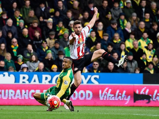 Fabio Borini and Martin Olsson in action during the Premier League game between Norwich City and Sunderland on April 16, 2016