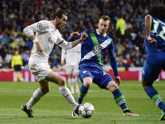 Gareth Bale and Maximilian Arnold in action during the Champions League quarter-final between Real Madrid and Wolfsburg on April 12, 2016