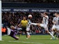 Heurelho Gomes makes a diving save during the Premier League match between West Bromwich Albion and Watford on April 16, 2016