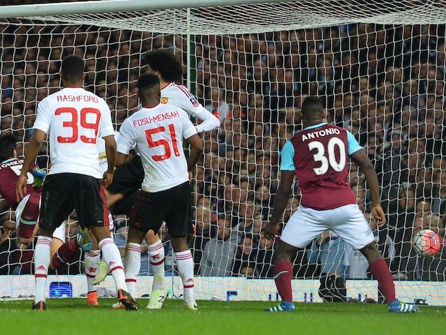 James Tomkins heads in during the FA Cup replay between West Ham United and Manchester United on April 13, 2016