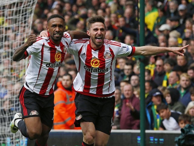 Jermain Defoe and Fabio Borini celebrate their second during the Premier League game between Norwich City and Sunderland on April 16, 2016