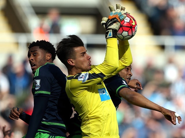Karl Darlow and Leroy Fer during the Premier League match between Newcastle United and Swansea City on April 16, 2016
