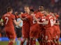 Reds players celebrate after winning the Europa League quarter-final between Liverpool and Borussia Dortmund on April 14, 2016