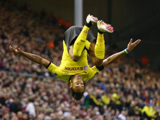 Pierre-Emerick Aubameyang celebrates scoring the second during the Europa League quarter-final between Liverpool and Borussia Dortmund on April 14, 2016