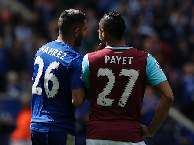 Riyad Mahrez and Dimitri Payet during the Premier League match between Leicester City and West Ham United on April 17, 2016