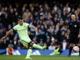 Sergio Aguero scores from the spot for his hat-trick during the Premier League game between Chelsea and Manchester City on April 16, 2016