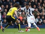 Stephane Sessegnon and Nathan Ake during the Premier League match between West Bromwich Albion and Watford on April 16, 2016