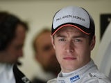 McLaren's Belgian driver Stoffel Vandoorne looks on ahead of the first practice session at the Sakhir circuit in Manama on April 1, 2016 ahead of the Bahrain Formula One Grand Prix
