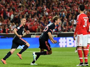 Thomas Muller celebrates scoring during the Champions League quarter-final between Benfica and Bayern Munich on April 13, 2016