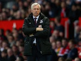 Alan Pardew is on the defensive during the Premier League game between Manchester United and Crystal Palace on April 20, 2016