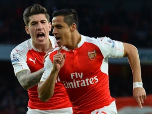 Sanchez double guides Arsenal past West Brom