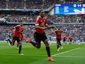Late Martial strike wins thrilling cup tie for United