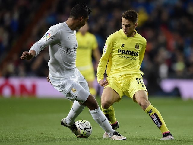 Casemiro vies with Denis Suarez during the La Liga game between Real Madrid and Villarreal on April 20, 2016