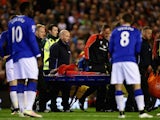 Divock Origi leaves the field on a stretcher during the Premier League game between Liverpool and Everton on April 20, 2016