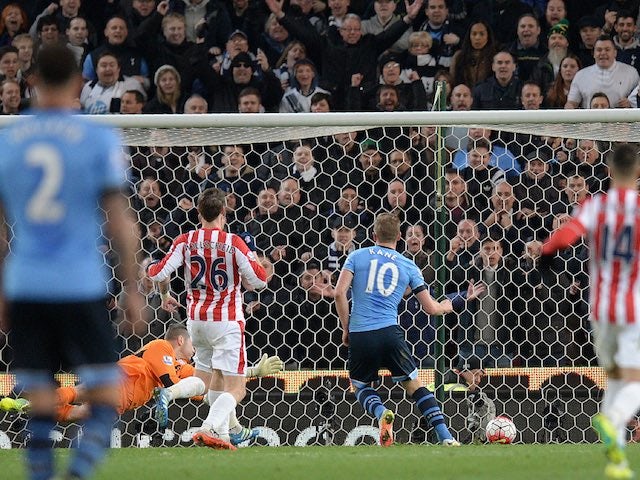 Harry Kane makes it three during the Premier League game between Stoke City and Tottenham Hotspur on April 18, 2016