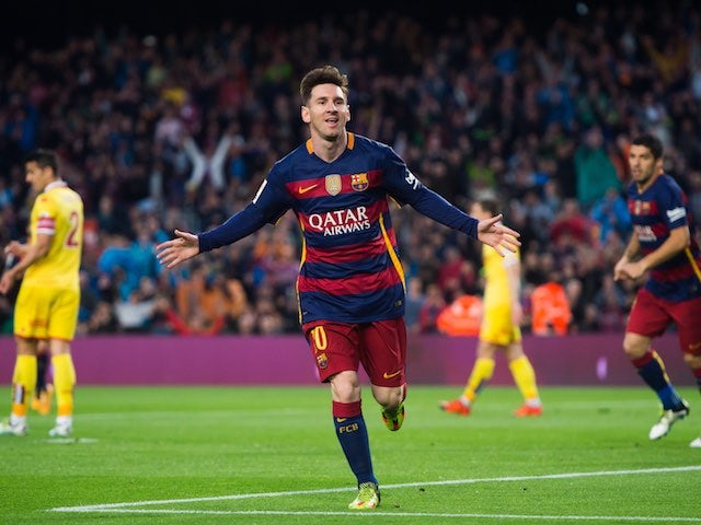 Lionel Messi celebrates scoring the opener during the La Liga game between Barcelona and Sporting Gijon on April 23, 2016
