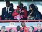Mamadou Sakho watches on from the stands during the Premier League game between Liverpool and Newcastle United on April 23, 2016
