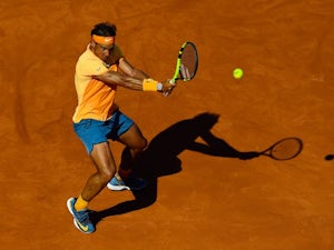 Nadal through in Rome after Almagro retires