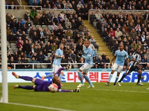 Newcastle, Man City share the points