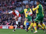 Alexis Sanchez has a shot on target during the Premier League game between Arsenal and Norwich City on April 30, 2016