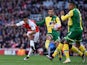 Alexis Sanchez has a shot on target during the Premier League game between Arsenal and Norwich City on April 30, 2016