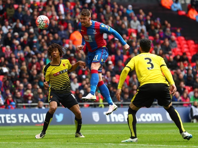 Connor Wickham scores Palace's second goal with a header during the FA Cup semi-final between Watford and Crystal Palace at Wembley Stadium on April 24, 2016