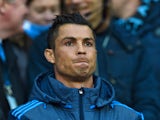 Real Madrid's Cristiano Ronaldo watches on from the sidelines during his side's Champions League semi-final first leg against Manchester City on April 26, 2016