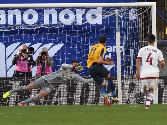 Giampaolo Pazzini of Hellas Verona rolls the ball for penalty during the Serie A match between Hellas Verona FC and AC Milan at Stadio Marc'Antonio Bentegodi on April 25, 2016