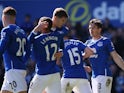 Leighton Baines and Aaron Lennon celebrate with John 'I'll take it' Stones during the Premier League game between Everton and Bournemouth on April 30, 2016