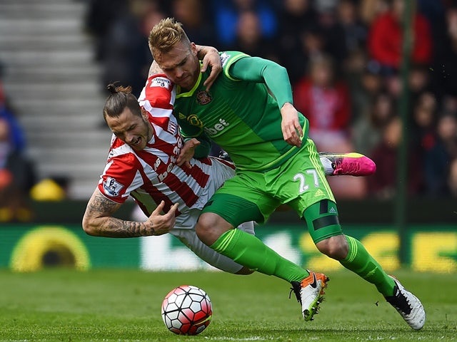 Marko Arnautovic and Jan Kirchhoff in action during the Premier League match between Stoke City and Sunderland on April 30, 2016