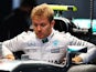 Nico Rosberg of Mercedes gets into his car in the garage during previews ahead of the Formula One Grand Prix of Russia at Sochi Autodrom on April 28, 2016