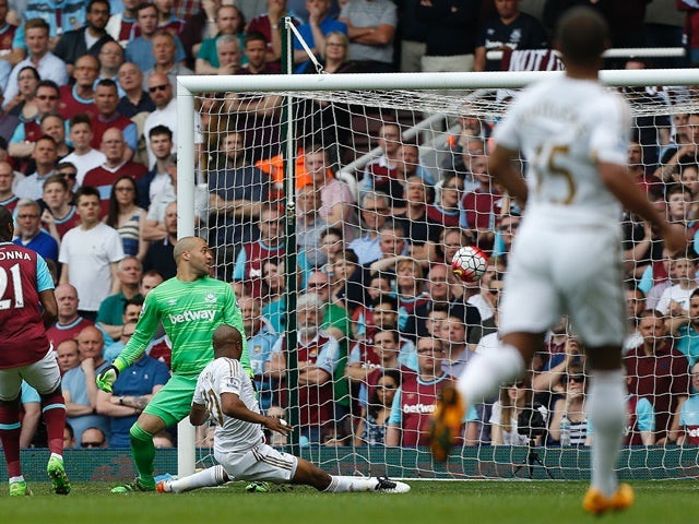 Andre Ayew scores during the Premier League match between West Ham United and Swansea City on May 7, 2016