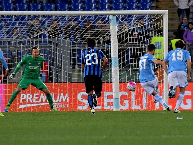 Antonio Candreva kicks to score a penalty during the Serie A match between Lazio and Inter Milan at Olympic Stadium in Rome on May 1, 2016