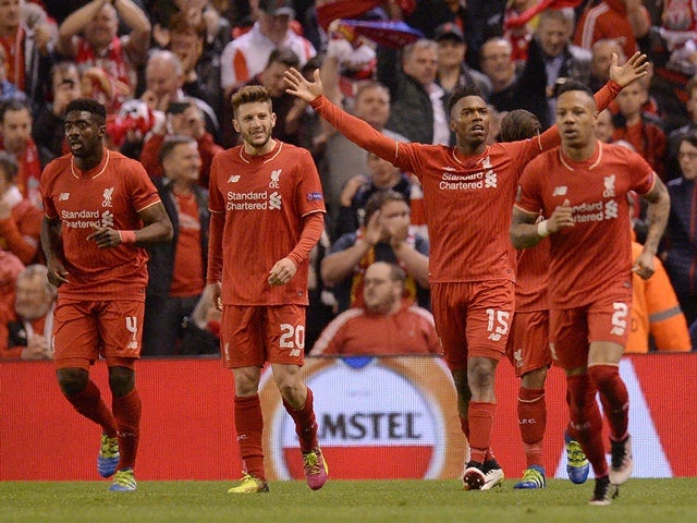 Daniel Sturridge celebrates scoring his team's second goal during the UEFA Europa League semi-final second leg between Liverpool and Villarreal at Anfield on May 5, 2016