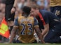 Arsenal forward Danny Welbeck sits on the floor injured on May 8, 2016
